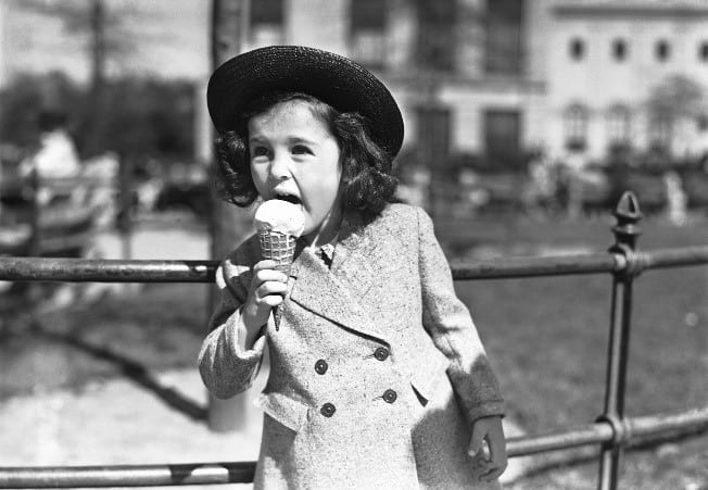 girl eating ice-cream with sensitive teeth