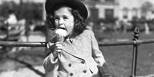 girl eating ice-cream with sensitive teeth